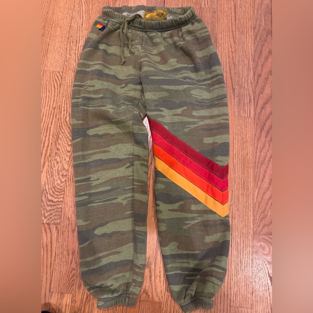 Aviator Nation Camo Track Joggers with Red-Orange-Yellow Chevron